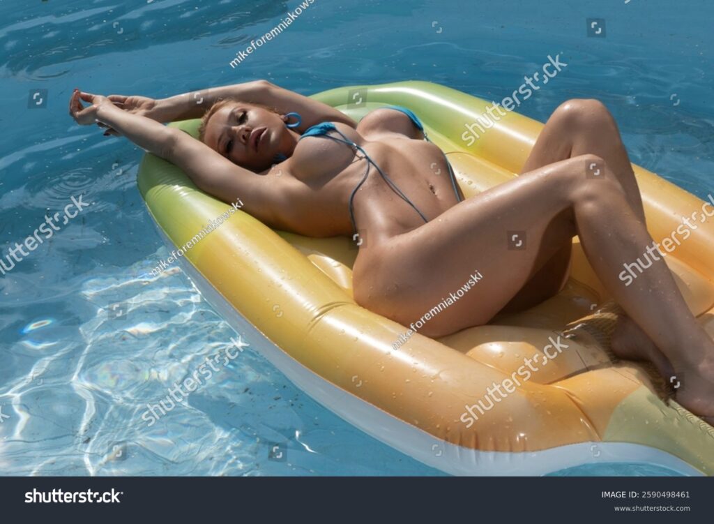 stock photo sexy blonde in bikini at the pool 2590498461 stock photo sexy blonde in bikini at the pool 2590498461